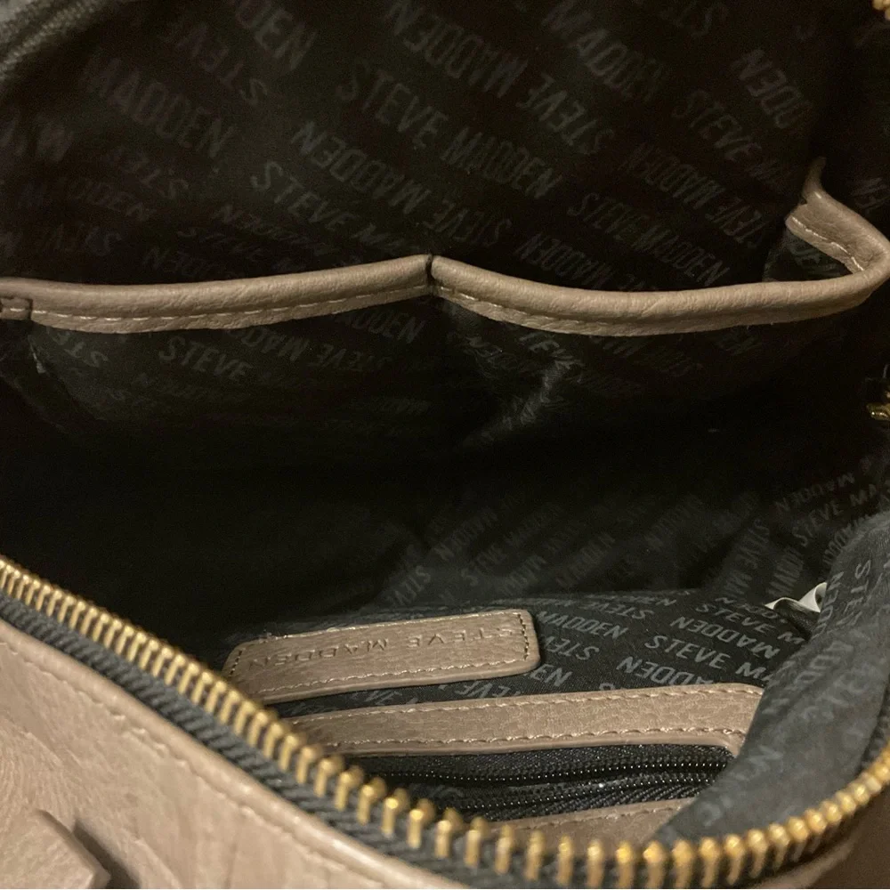 Steve Madden Cute Stylish Durable Mini Backpack Fringe Bag!